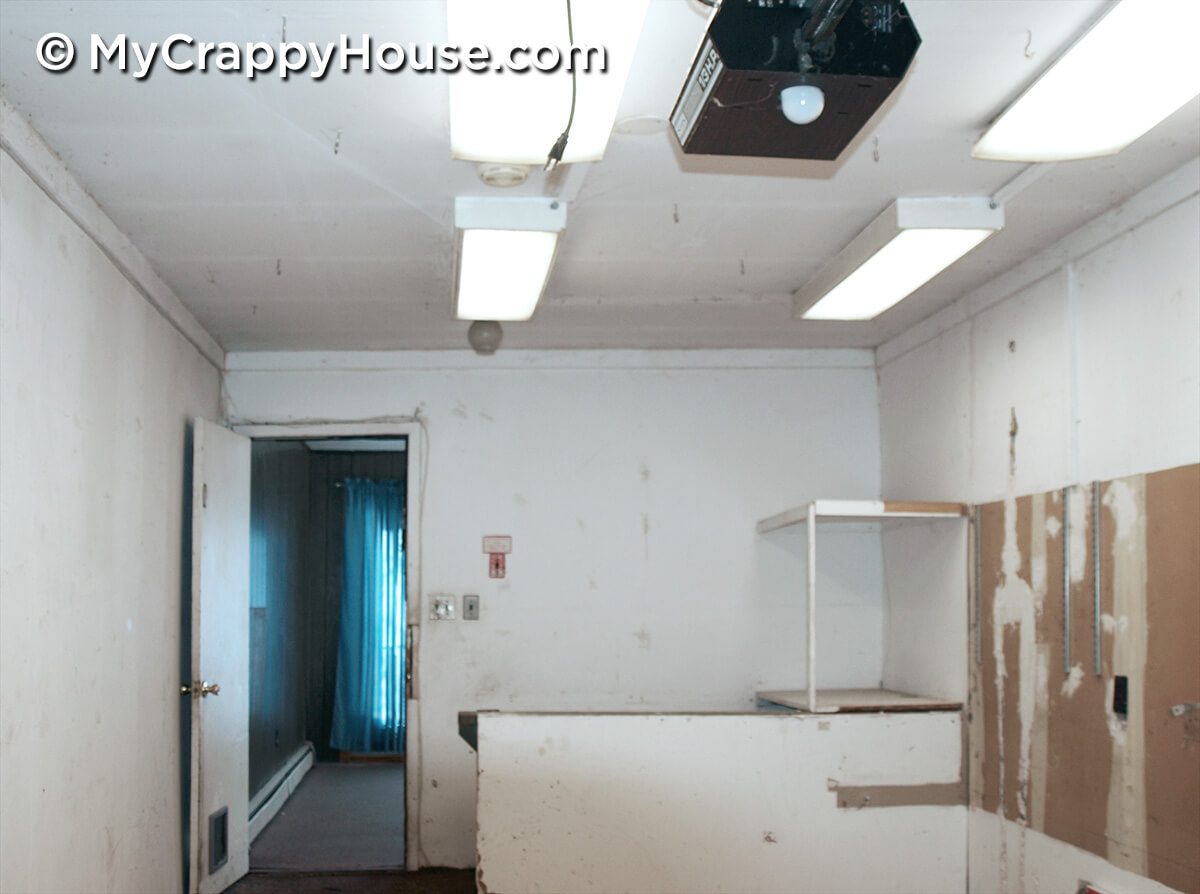 Stairs to basement inside garage