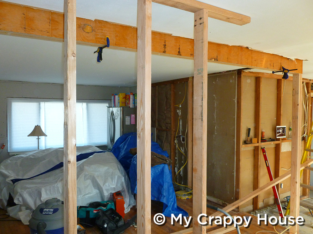 Load bearing wall removed with microlam beam in place