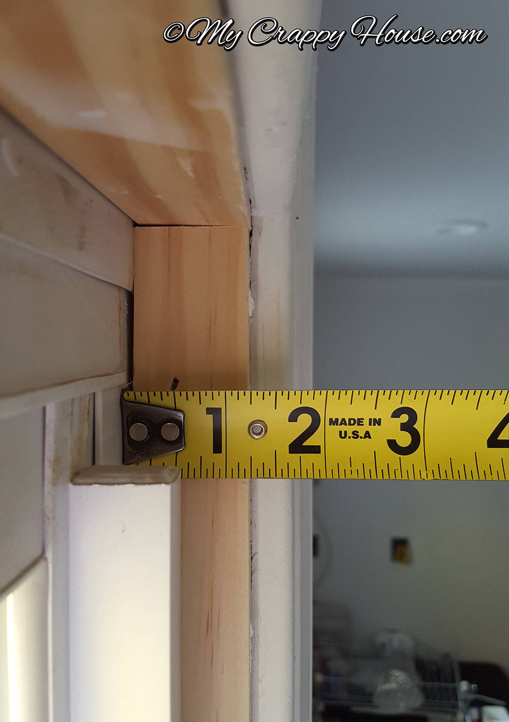 Tape measure showing window depth