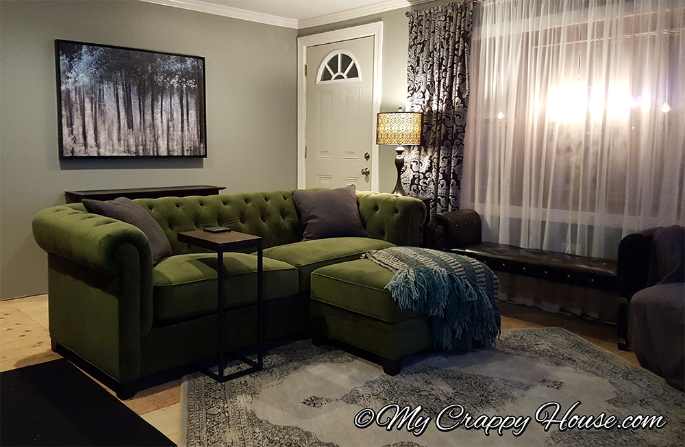 Living room set up with My Tufted Green Velvet Couch