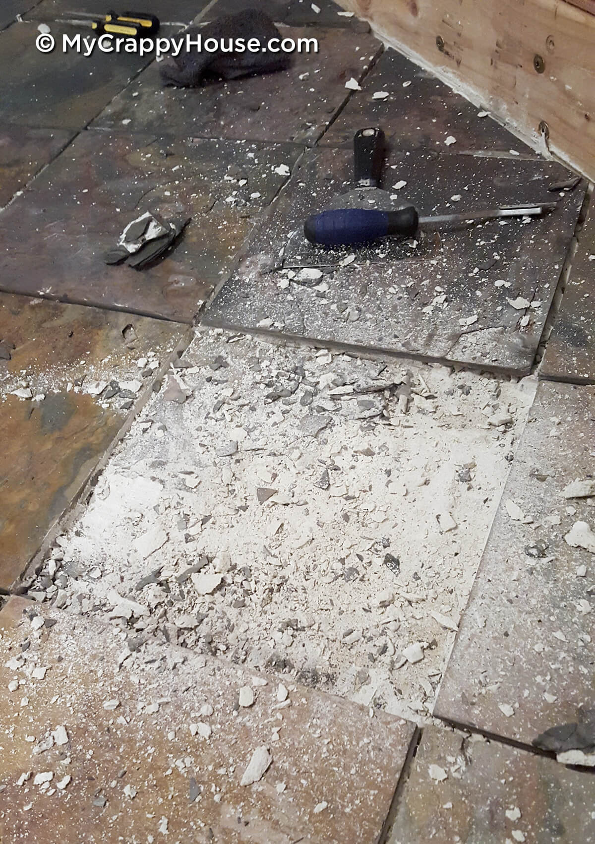 Shattered slate tile from being removed