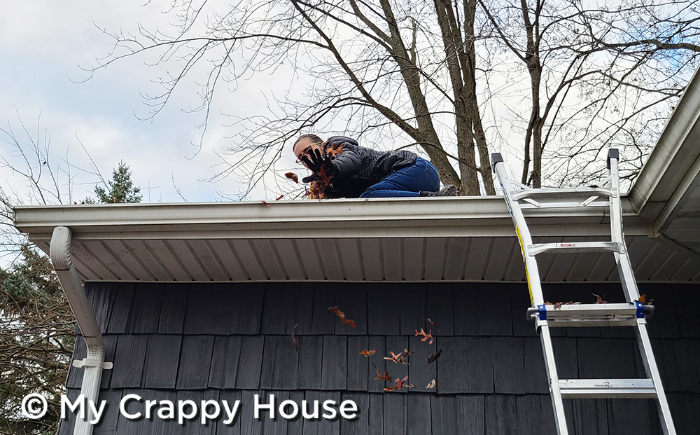 Cleaning the gutters on the roof