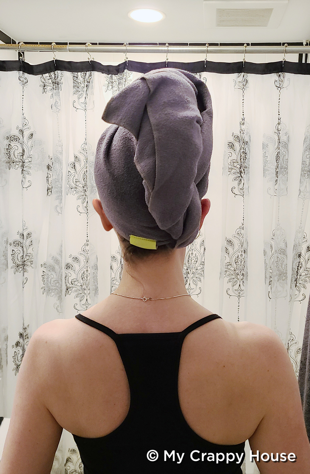 Aquis hair towel on head