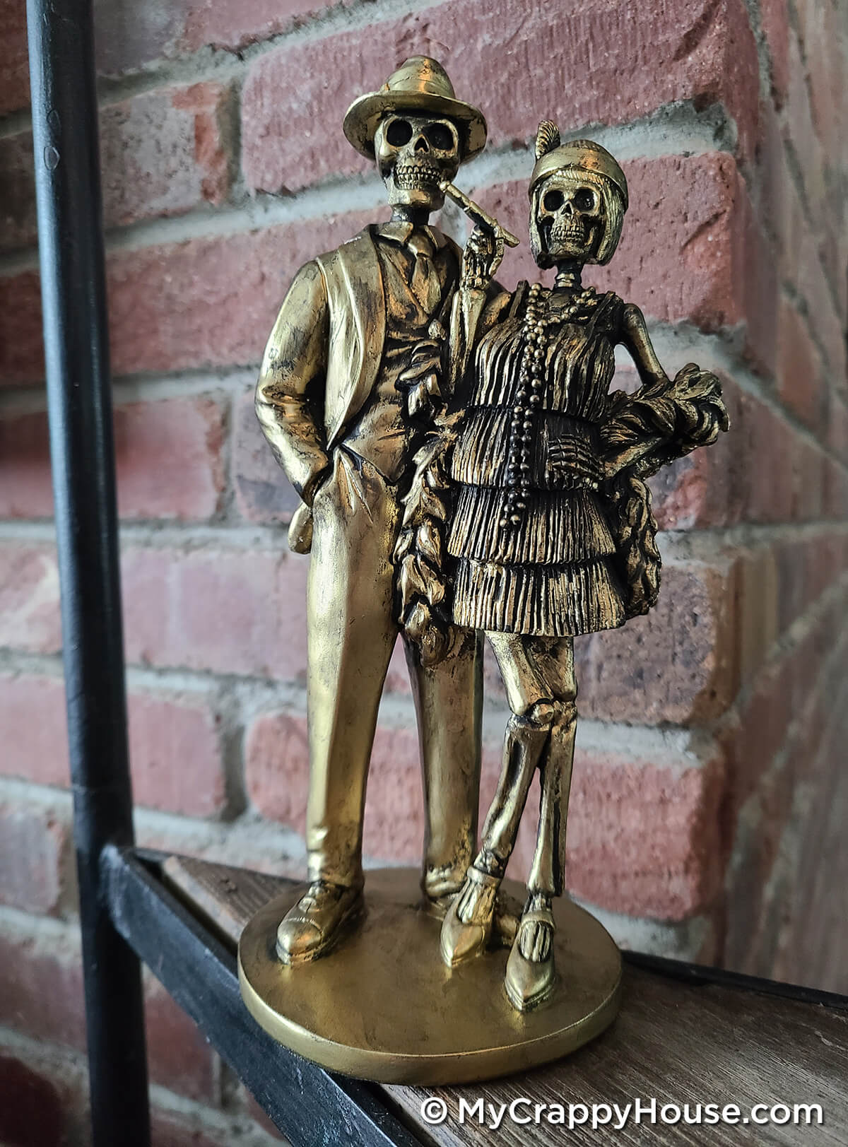1920s skeleton painted gold figurine with black antiquing