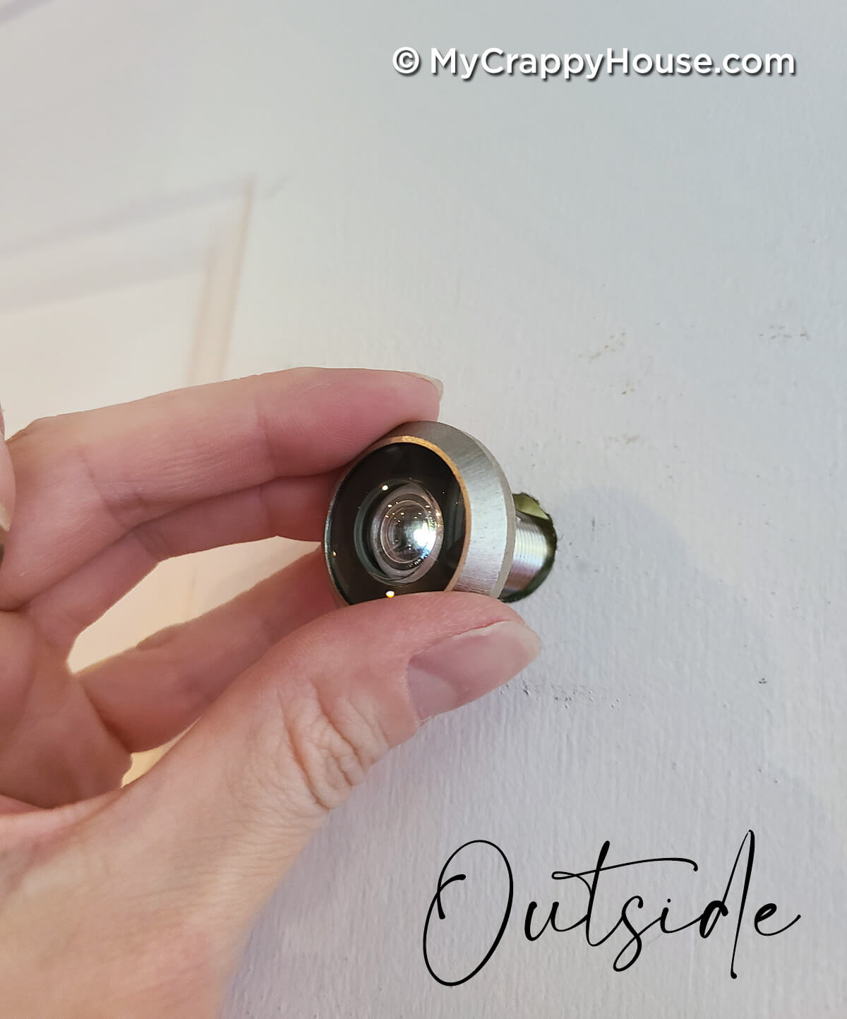 Installing a peephole on the outside of the door