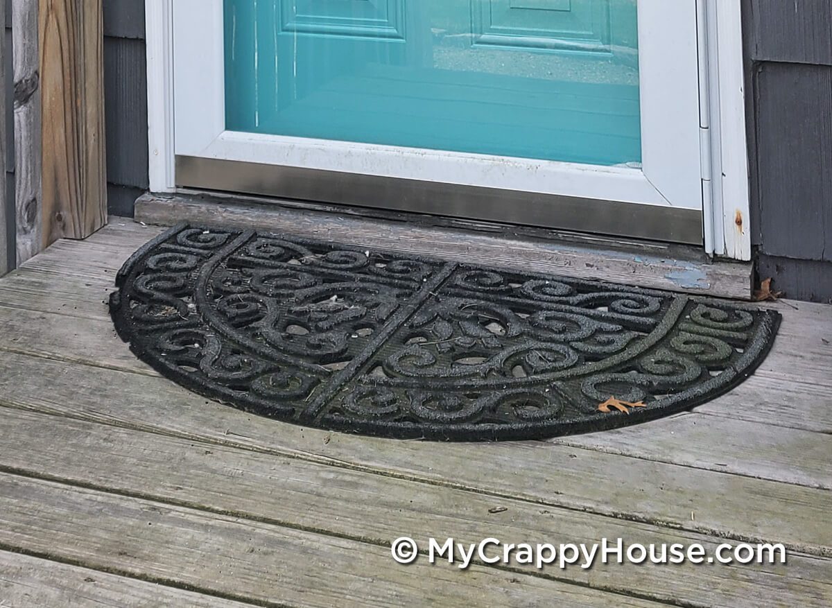 Close up of old door mat