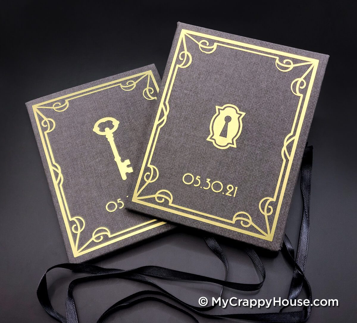 Handmade hardback vow books with vinyl applique