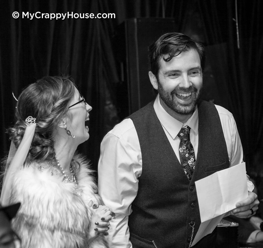 1920s bride and groom laughing